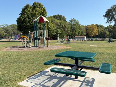 Table and Playground Equipment at Washington Park